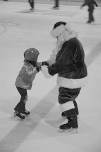 Courtesy of Union Arena A youngster enjoys a special skate with Santa himself on the ice at Union Arena in Woodstock. 