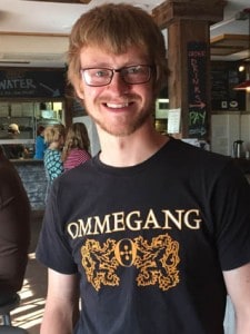 Tom Poole wearing an Ommegang shirt